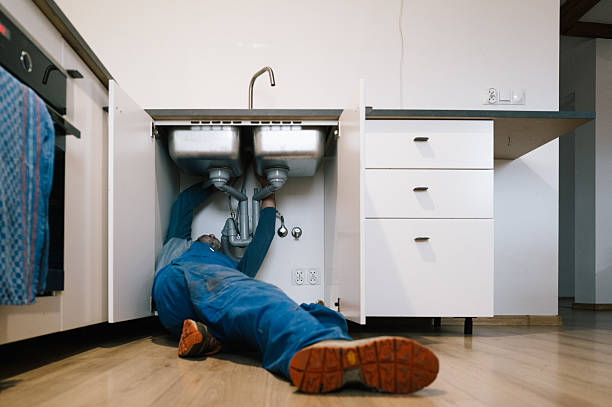 Professional Emergency Plumber technician working in Centralia, IL